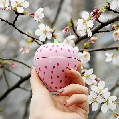 Pink strawberry cartoon cake kitchen timer with dotted pattern and green stem for cake kitchen use