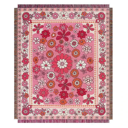 A vibrant pink cat strawberry knitted blanket with bold floral pattern and tassels for bedroom or sofa decorbites use