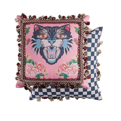 Pink velvet cushion cover with bold embroidered tiger cat print orange eyes blue fur floral pattern and tassels