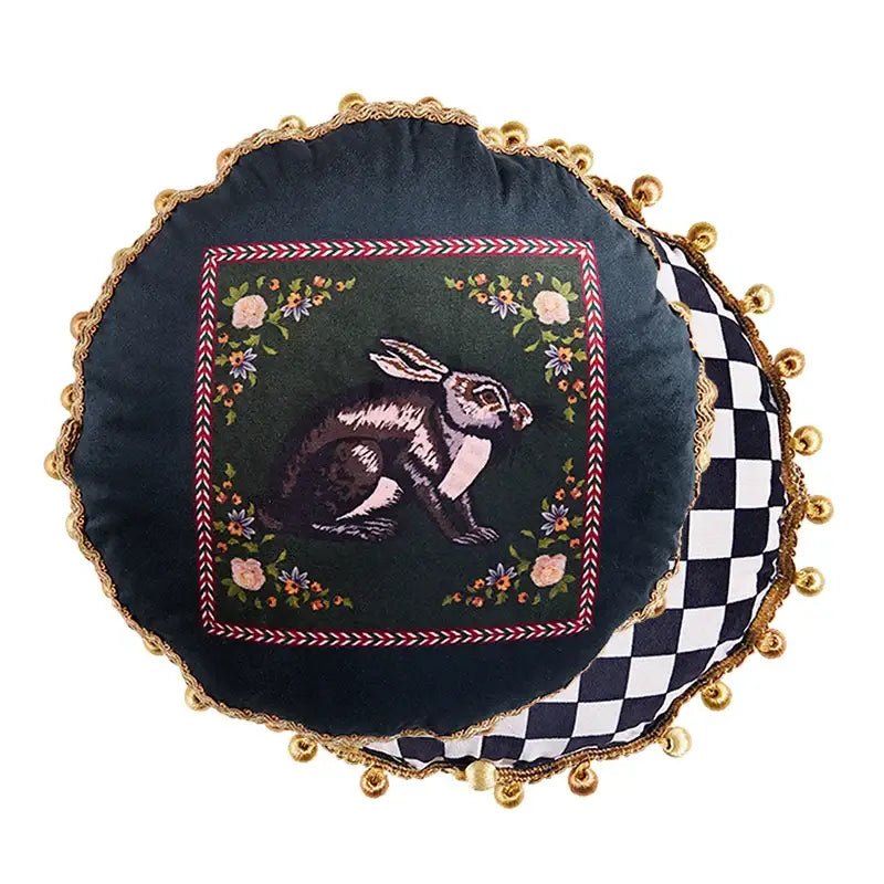Dark green velvet round cushion cover with embroidered rabbit floral motifs and gold tassels for living room decor