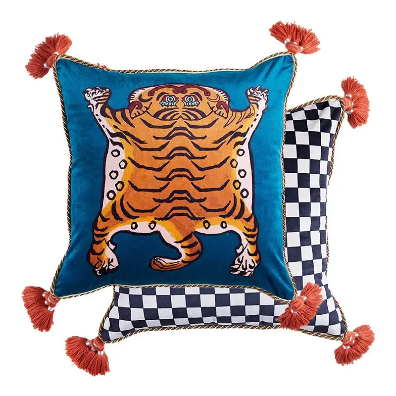 Vibrant teal velvet cushion cover with bold orange tiger cat print and rust tassels for living room decor