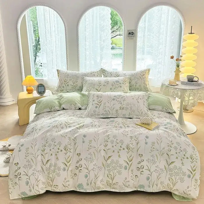 A soft white cotton printed bedding set with delicate green and gray botanical prints from decorbites satin finish