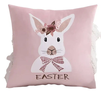 Pink plush cushion cover featuring an embroidered white bunny with floral crown and easter lettering for decorbites bunny cushion decor