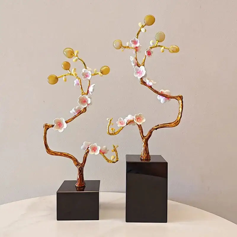 Pink and white golden tree crystal ball statue with delicate cherry blossom flowers on sleek black bases for decorbites decor