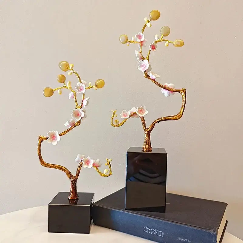 Pink and white golden tree crystal ball statue with delicate flowers and glossy yellow beads on a black base decorbites golden tree decor