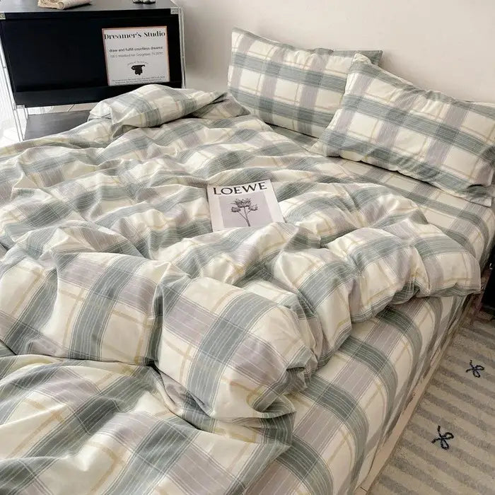 Plaid cream and charcoal cotton grid bedding set in soft muted green and cream tones with cozy textured decorbites cotton grid fabric