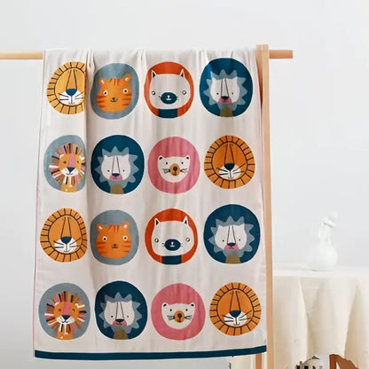 Cream lions bath towel made of quick dry cotton with colorful cartoon animal faces for playful bathroom decorbites lions bath