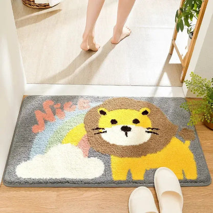 A plush gray bath rug featuring a cheerful yellow lion with a brown mane and a pastel rainbow for cartoon animal bathroom decorbites