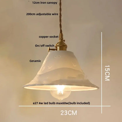 Pleated white fabric pendant light with off-white ceramic wood pendant and bird motifs featuring brass copper socket