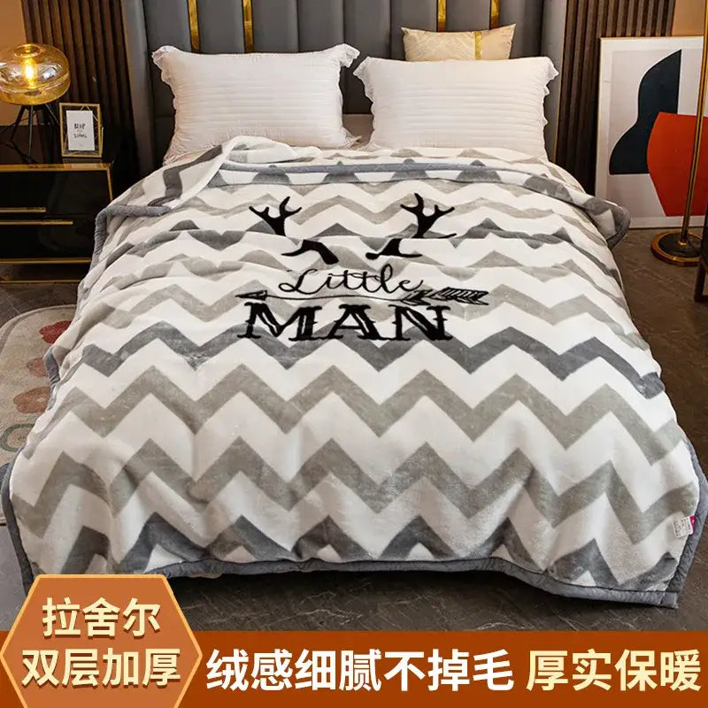 Cozy black and white chevron raschel blanket with plush double-layer material and deer silhouette graphic for winter decorbites