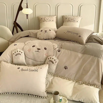 Beige plush cartoon bear applique cotton bedding set with embroidered paw prints and good luck message on pillows