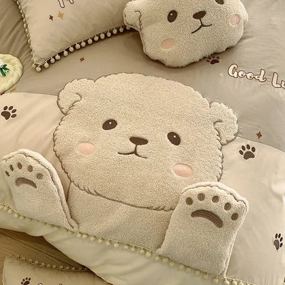 Cream cotton bedding set featuring a plush cream cartoon bear applique with embroidered face and paw feet details