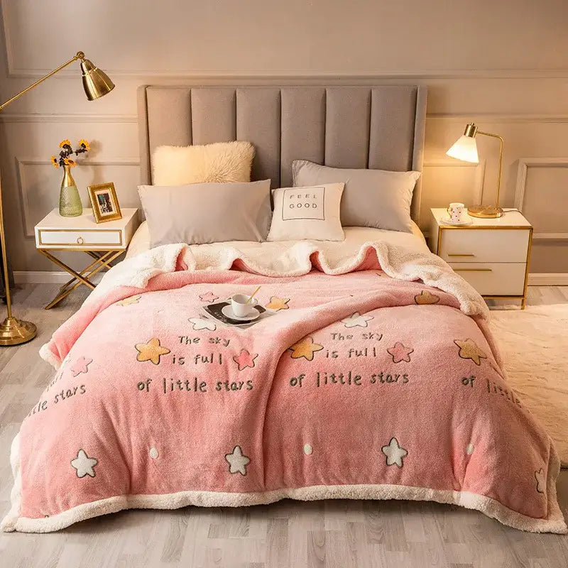 Plush cream floral fleece wool blanket with pink embroidered stars fleece wool blanket featuring white fleece trim