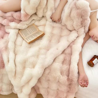 A plush cream and gradient pink double layer faux fur throw blanket with a soft textured surface for decorbites gradient pink