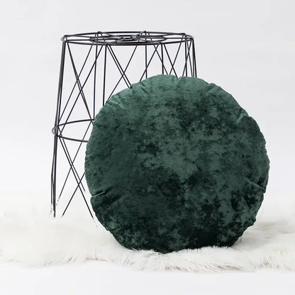 A plush dark grain velvet pillow cover in deep emerald green with a soft textured surface for living room decor