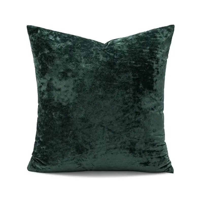 Deep emerald green velvet pillow cover with plush textured surface for living room decor featuring dark grain velvet