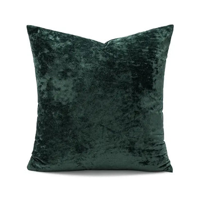 Deep emerald green velvet pillow cover with plush textured surface for living room decor featuring dark grain velvet