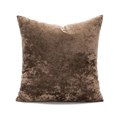 A square plush dark grain velvet pillow cover in taupe with a mottled texture and soft sheen for living room decor