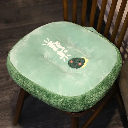 Soft mint-green plush chair cushion with embroidered avocado face and have a nice day text for cat shark cushion use