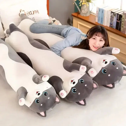 Plush gray and white cat sleeping body pillow with embroidered features and pink paw pads for decorbites husky decor