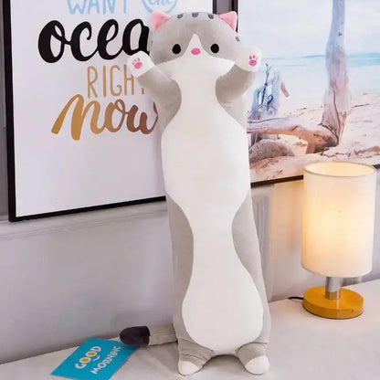 Plush gray and white cat sleeping body pillow with pink inner ears and paw pads for bedroom decorbites husky decor