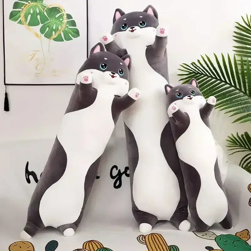 Three plush gray and white cat-shaped body pillows with blue eyes and pink paw pads for decorbites husky bedroom decor