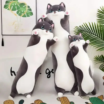Three plush gray and white cat-shaped body pillows with blue eyes and pink paw pads for decorbites husky bedroom decor