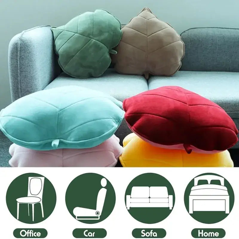Plush leaf shaped throw pillows in sage and mustard displayed with green beige teal red pink and yellow decorbites 3d leaf pillows on sofa