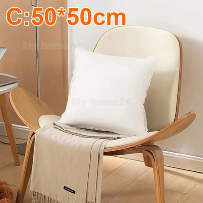 White square decorbites cotton-padded pillow core resting on wooden chair for living room cushion insert