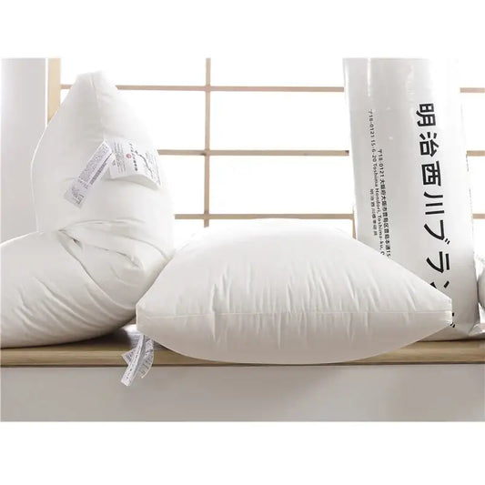 Plush white quilted cotton rectangle neck pillow with soft stitching details for decorbites bedroom decor