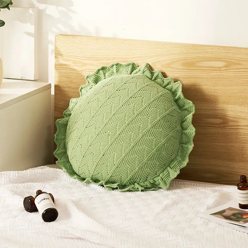 A soft light green knitted pillow with ruffled edge and diagonal pattern for home decor and decorbites 3d flowers pillows