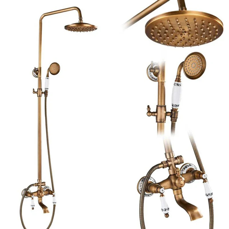 Brass-finished vintage-style shower system with ceramic knobs handheld spray head and swivel spout for wall mounting