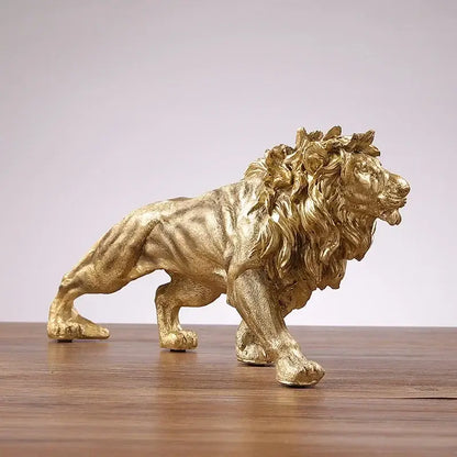 Polished golden lion king resin statue with detailed mane and textured surface on wooden table decorbites golden lion