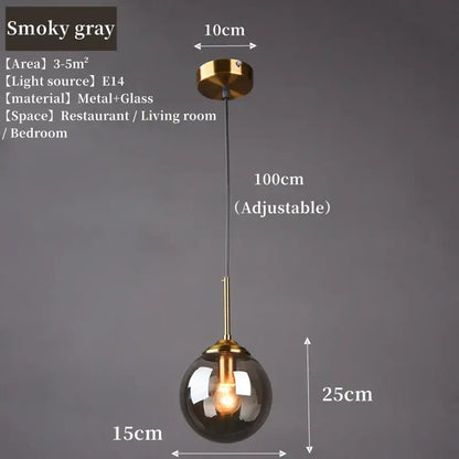 Polished steel glass pendant light trio featuring smoky gray glass and brass fixture with adjustable chain for dining room