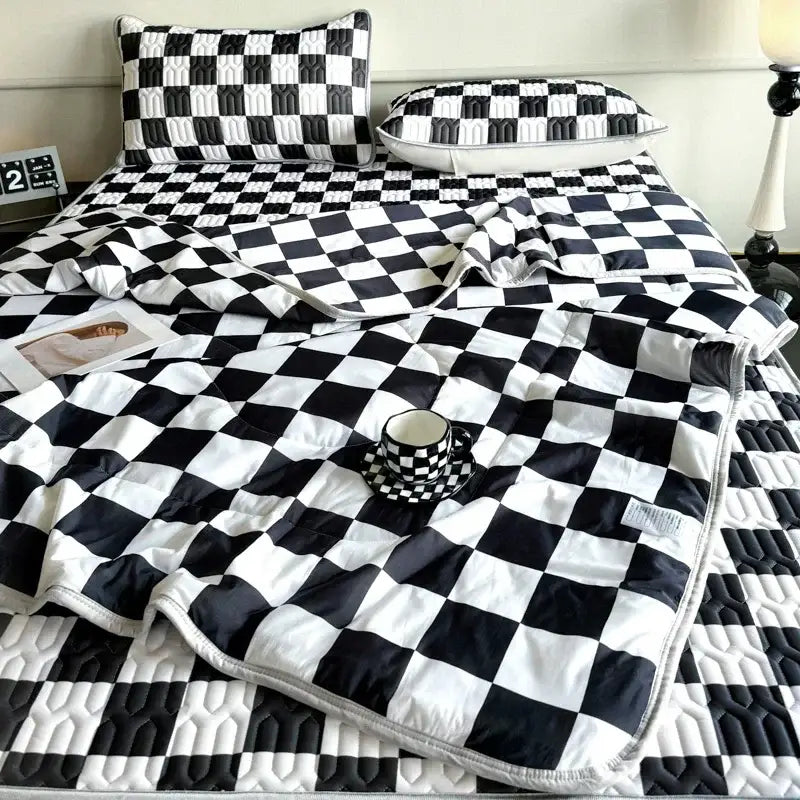 Black and white checkered quilted cool comforter set with matching pillow sham in polka dot smile ruffled bedding