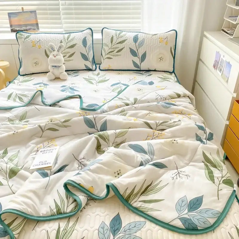 White quilted cool comforter set with green blue yellow leaf floral pattern and teal piping from polka dot smile collection