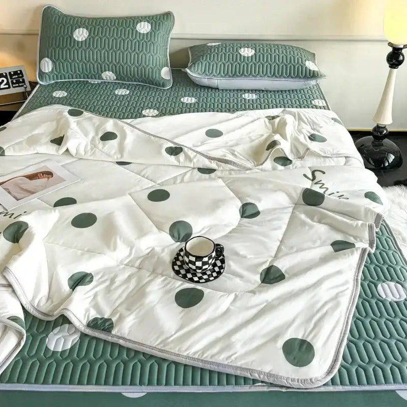 White quilt with green polka dots and smile design in soft cotton finish cool comforter set for bedroom use