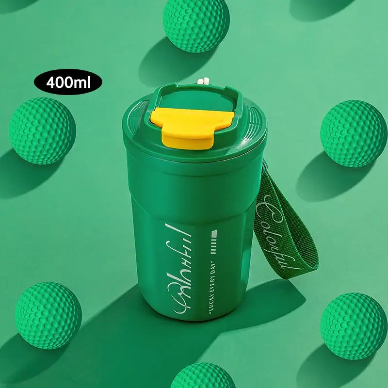 Green 400ml coffee thermos bottle with yellow flip lid and lucky strap designed as a portable insulated kitchen shaker cup