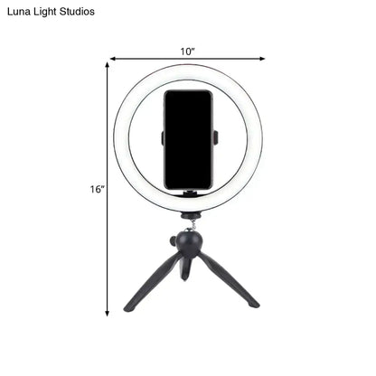 White circular led ring light with black smartphone mount and tripod base for 110v-120v and 220v-240v use