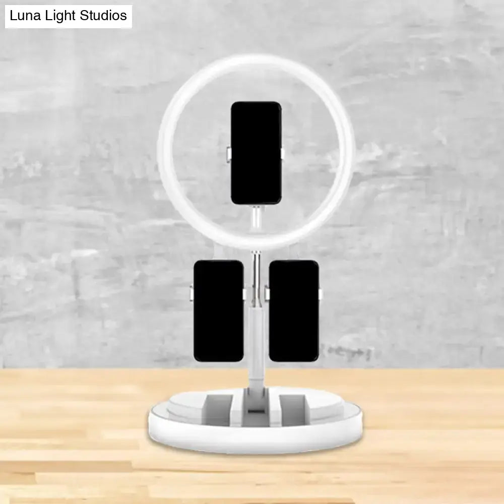 White circular ring light stand with three phone holders in pink and white usb port for 220v-240v use