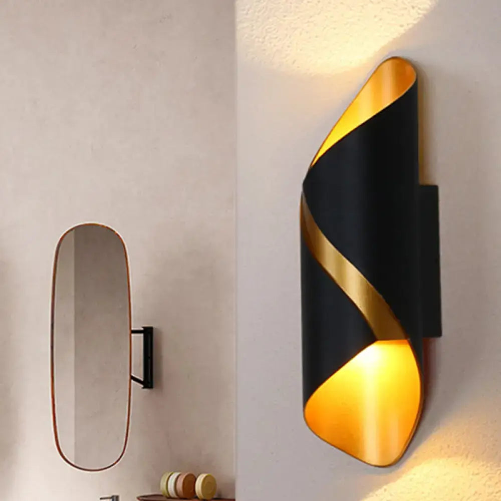 Modern black and gold spiral wall lamp with sleek curved design ideal as a living room wall light or tube bathroom fixture