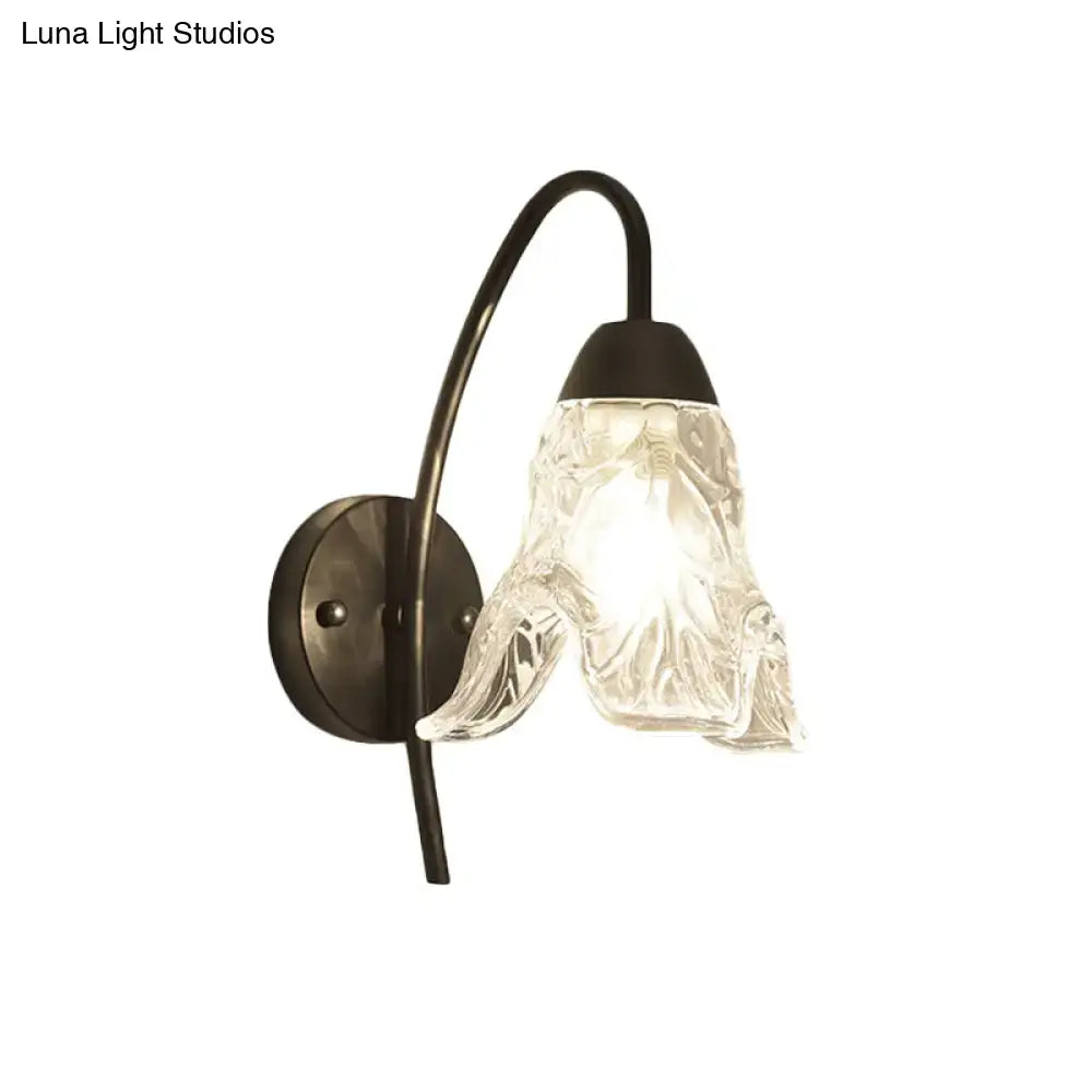 Post-modern black metal wall sconce with clear crystal shade and textured glass lampshade for bedroom lighting