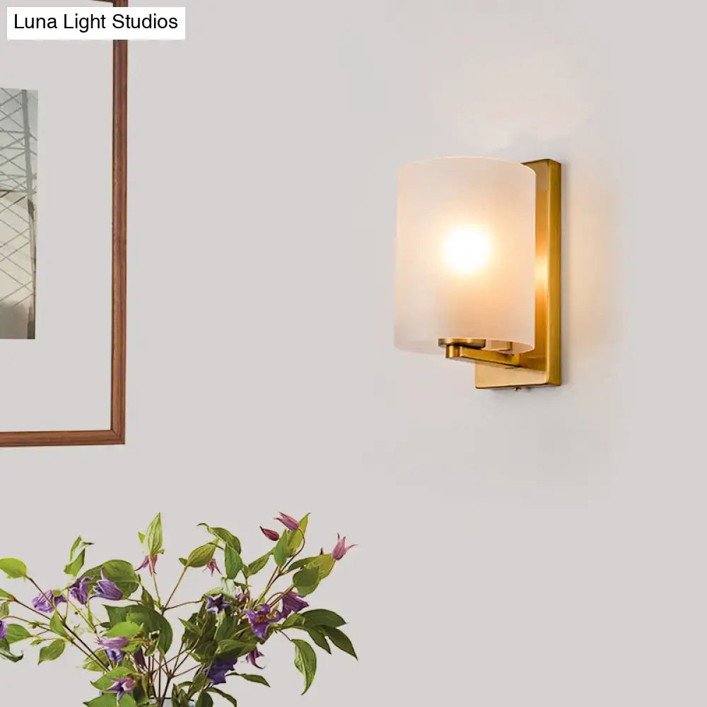 Post modern brass wall sconce with frosted glass shade featuring clear textured white light for bedroom use 110v-120v 220v-240v
