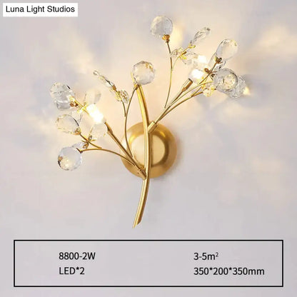 Post modern luxury gold crystal branch wall sconce with delicate faceted crystal droplets for bedroom lighting