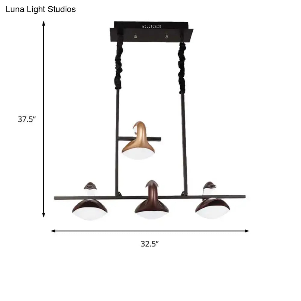 Modern black and bronze multicolored hanging pendant light with three shades and linear chandelier design for restaurants