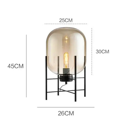 Postmodern amber glass ball floor lamp with frosted amber glass ball and black metal frame for living room decorbites floor lamp