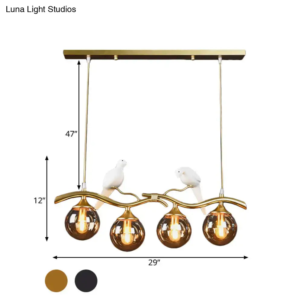 Decorbites postmodern black gold iron pendant light with amber ball glass shades and white ceramic bird accents