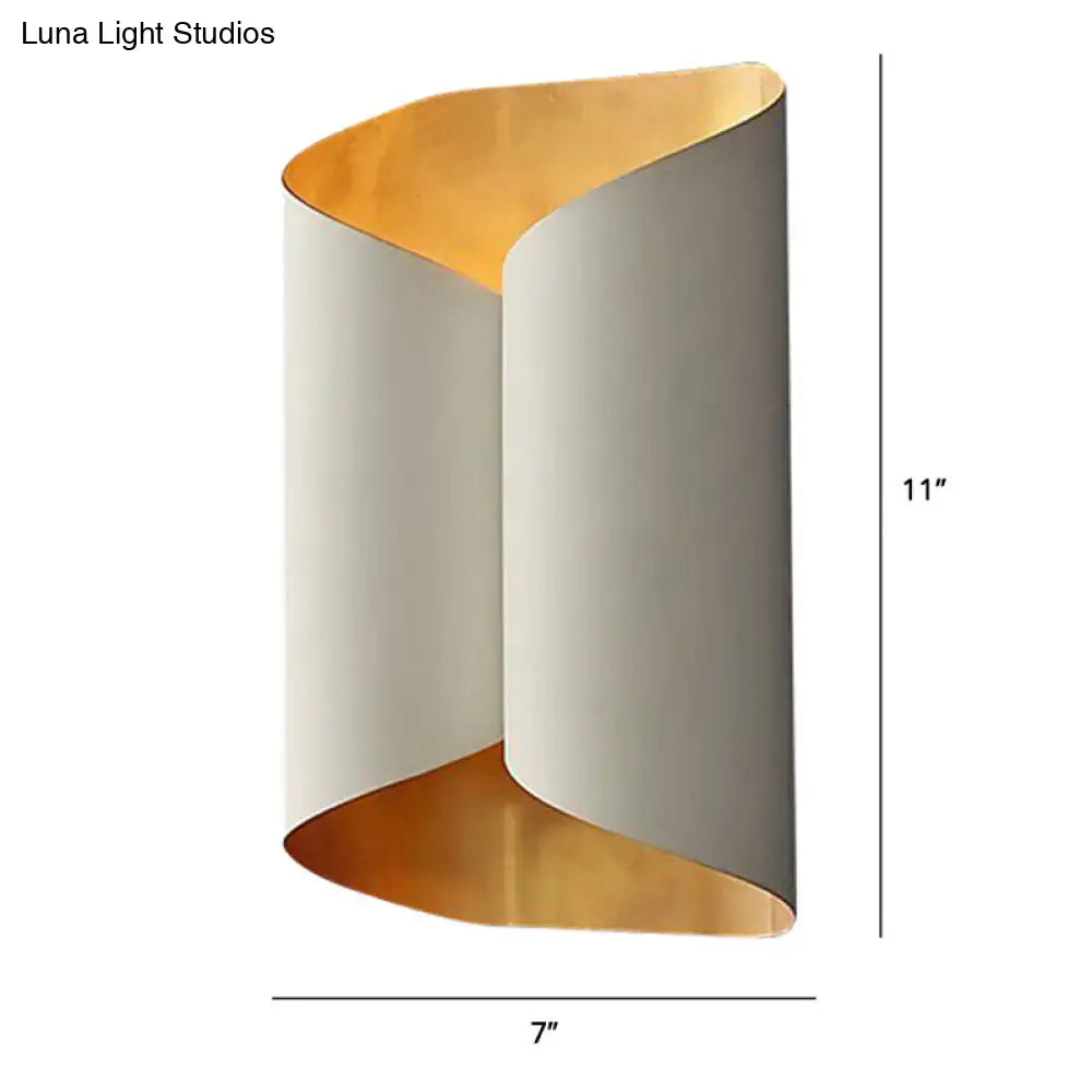 Postmodern black and gold roll metal wall lamp with sleek curved design, off-white exterior, and warm gold interior lining
