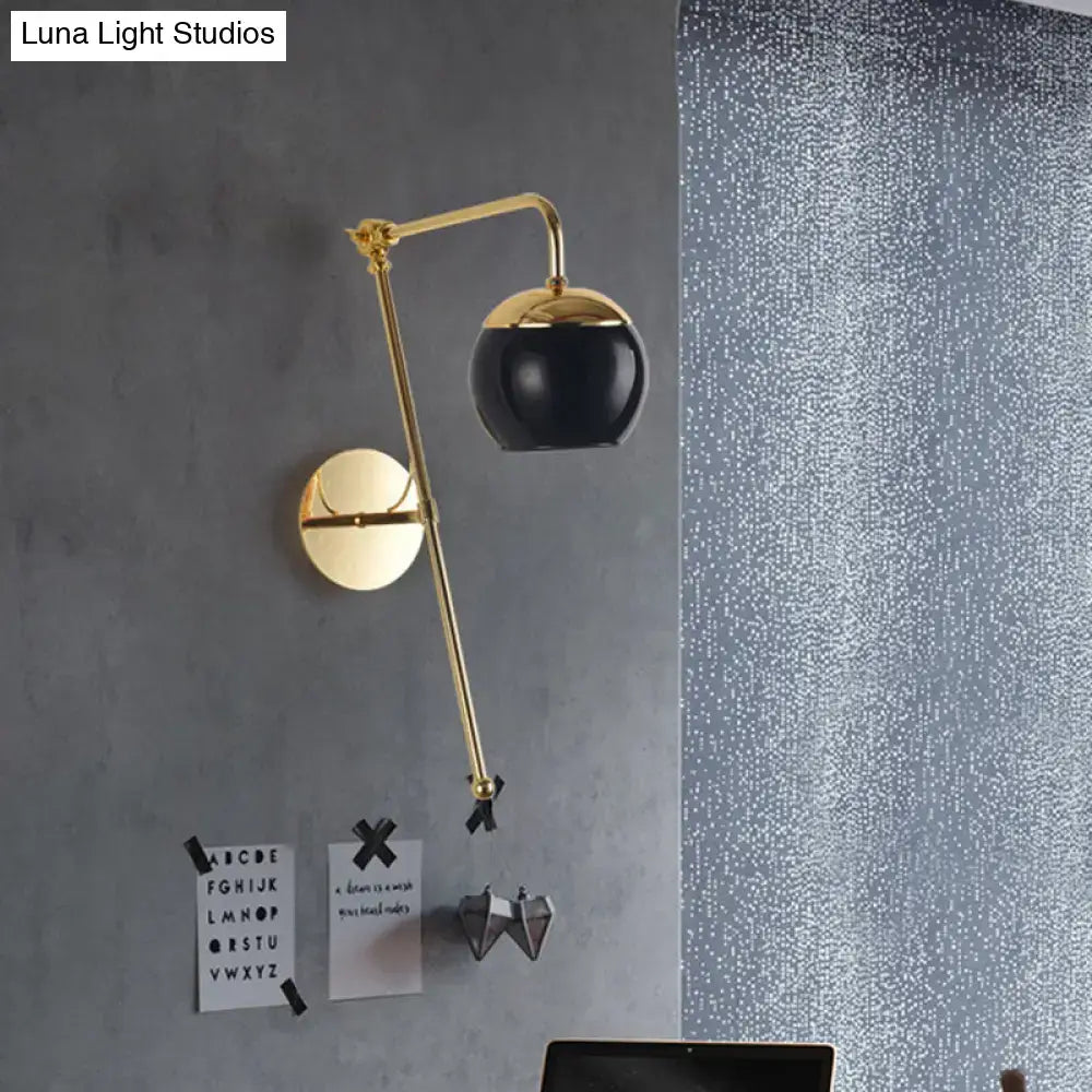 Postmodern black and gold swing arm wall sconce with clear glass and black spherical lampshade for bedroom lighting