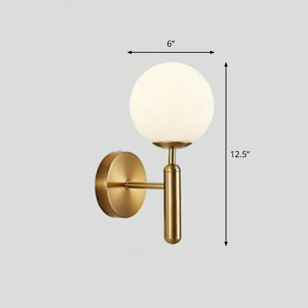 Postmodern brass-finished wall sconce with frosted glass globe in gold black for 110v-120v bedroom lighting